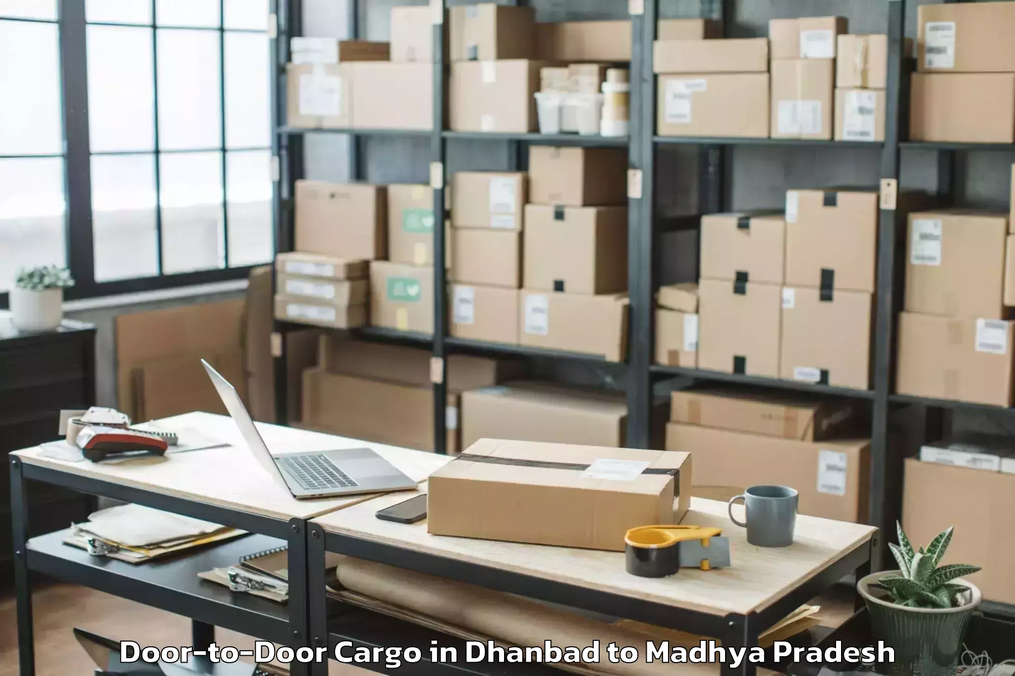 Top Dhanbad to Banikhedi Door To Door Cargo Available